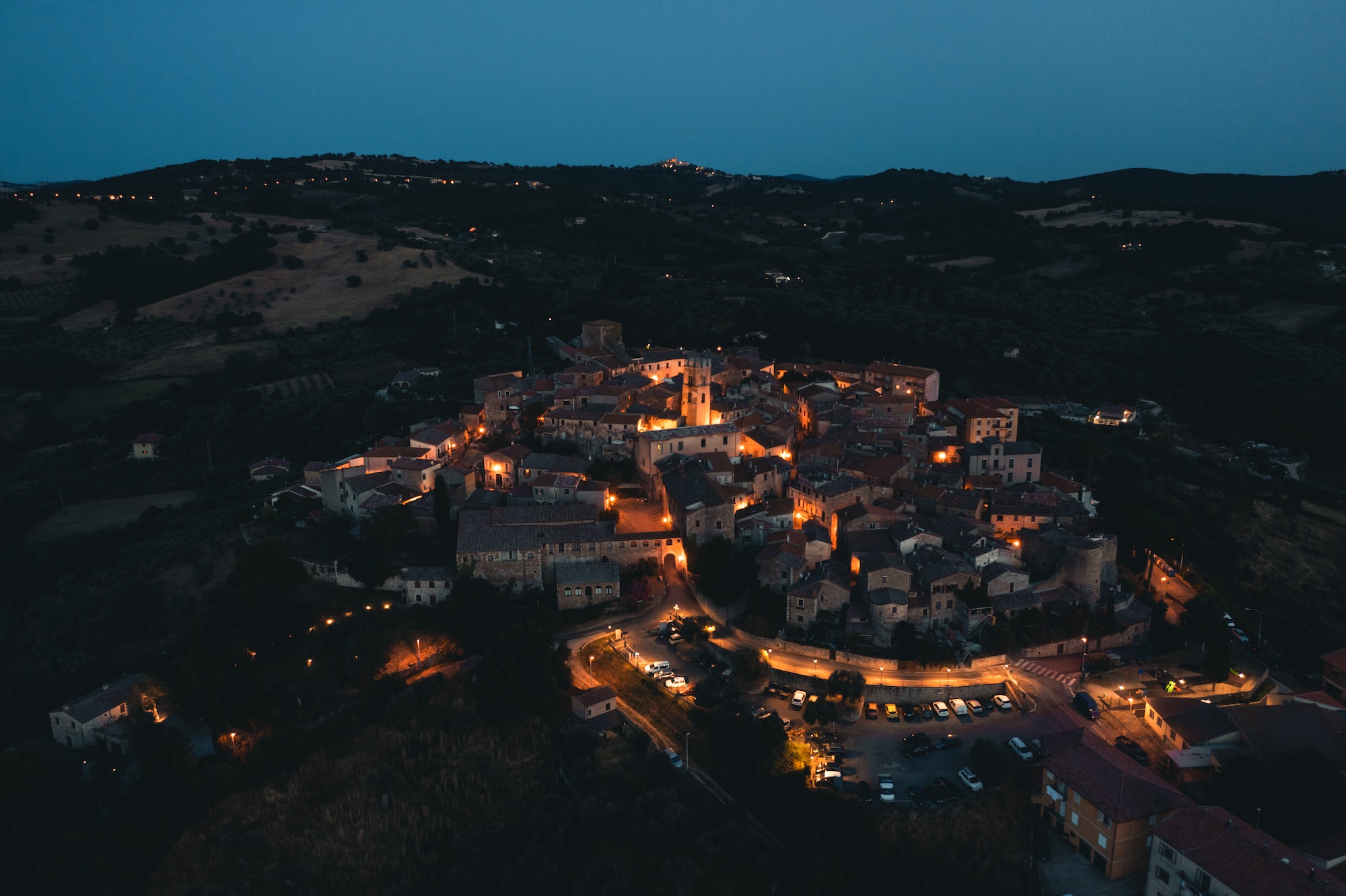 Aerial view of old town of Montemeranoby night, Tuscany, Italy.